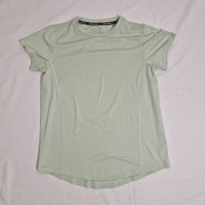 Light green t-shirt on a light gray background