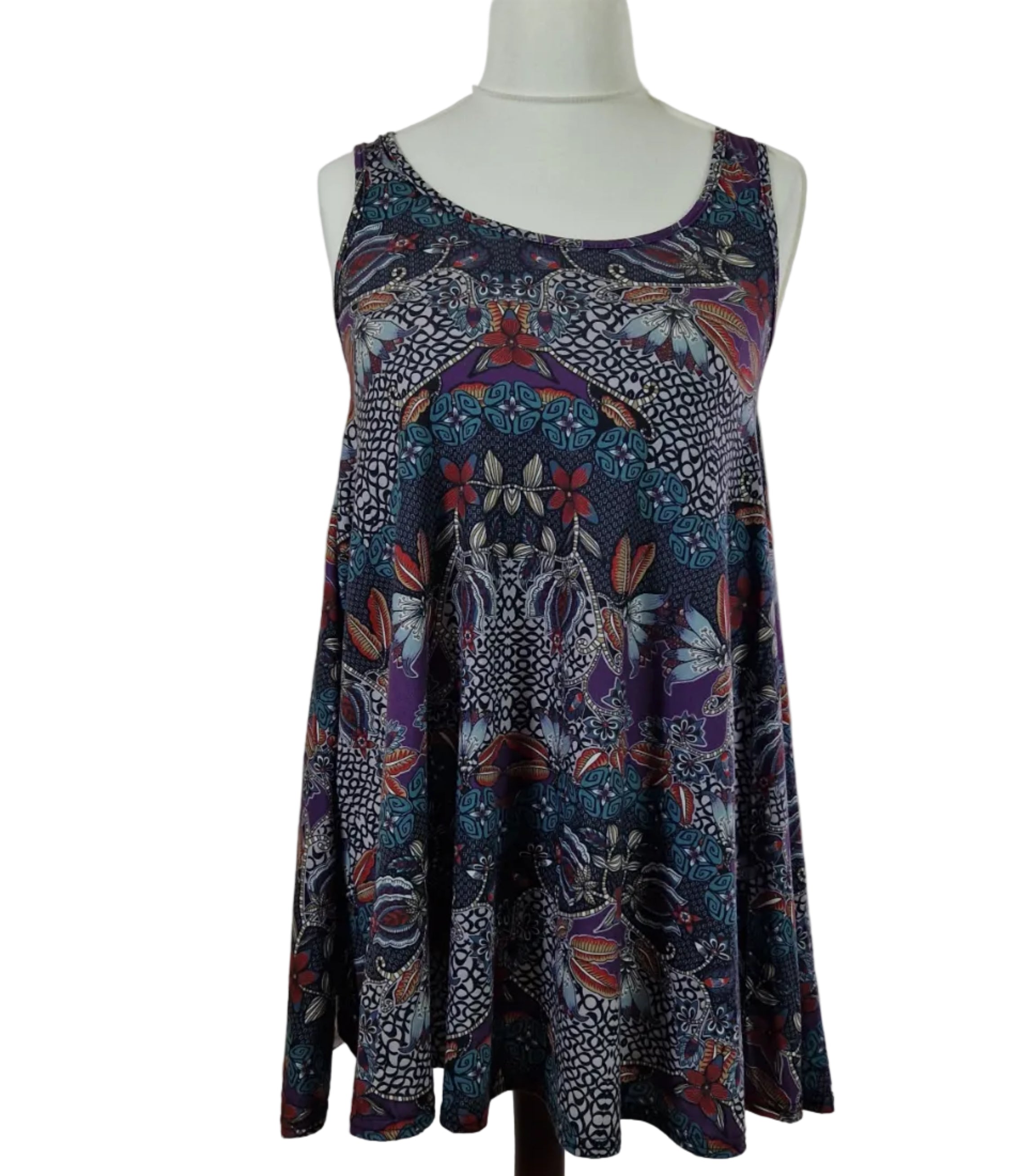 A sleeveless Boohoo beach top featuring a multicoloured patterned print and a round neckline.