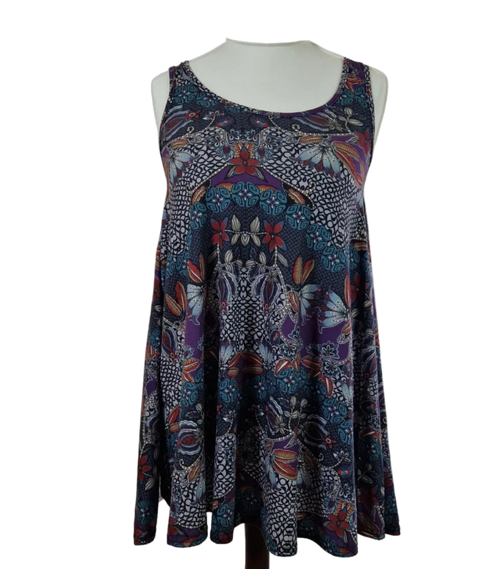A sleeveless Boohoo beach top featuring a multicoloured floral and geometric pattern.