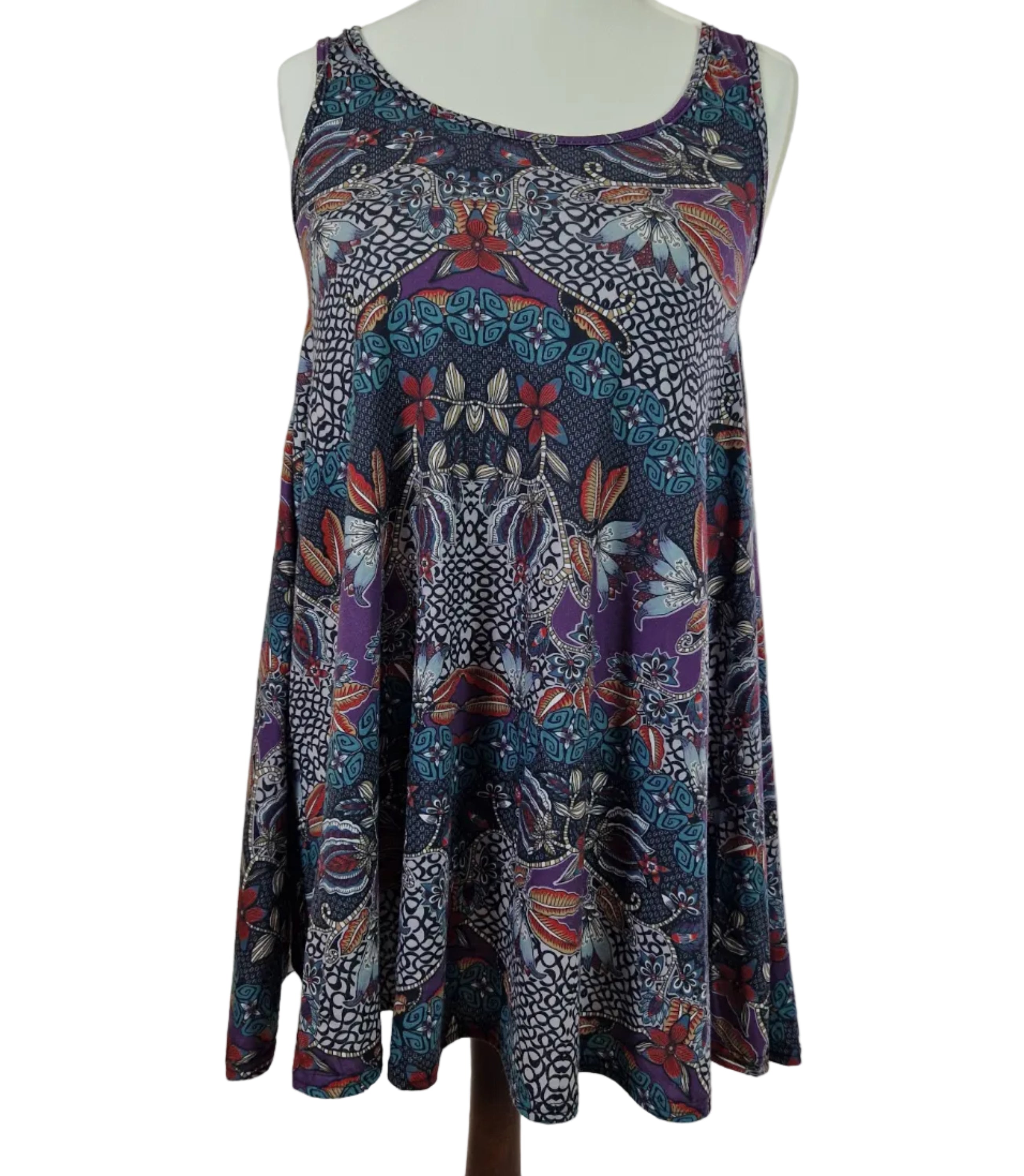 A sleeveless Boohoo beach top featuring a vibrant multicolour floral and geometric print.
