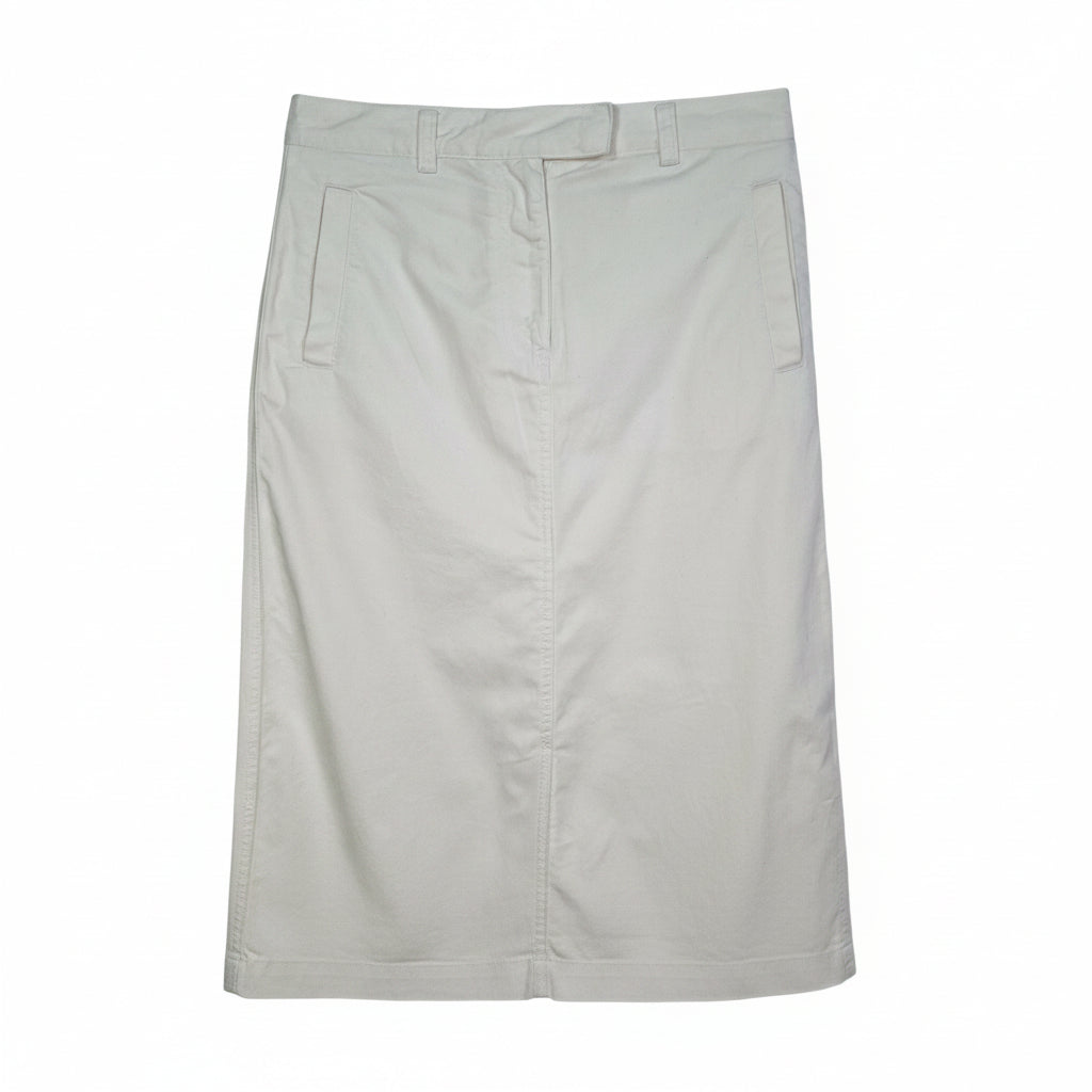 A white Uniqlo A-line midi skirt made from structured cotton twill with a mid-rise waist.
