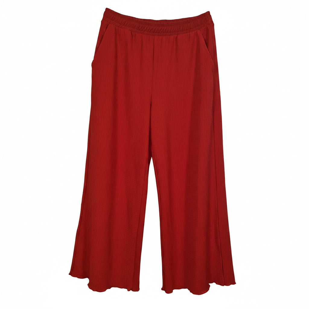 Red wide-leg trousers for women featuring an elasticated waistband and scalloped hems.