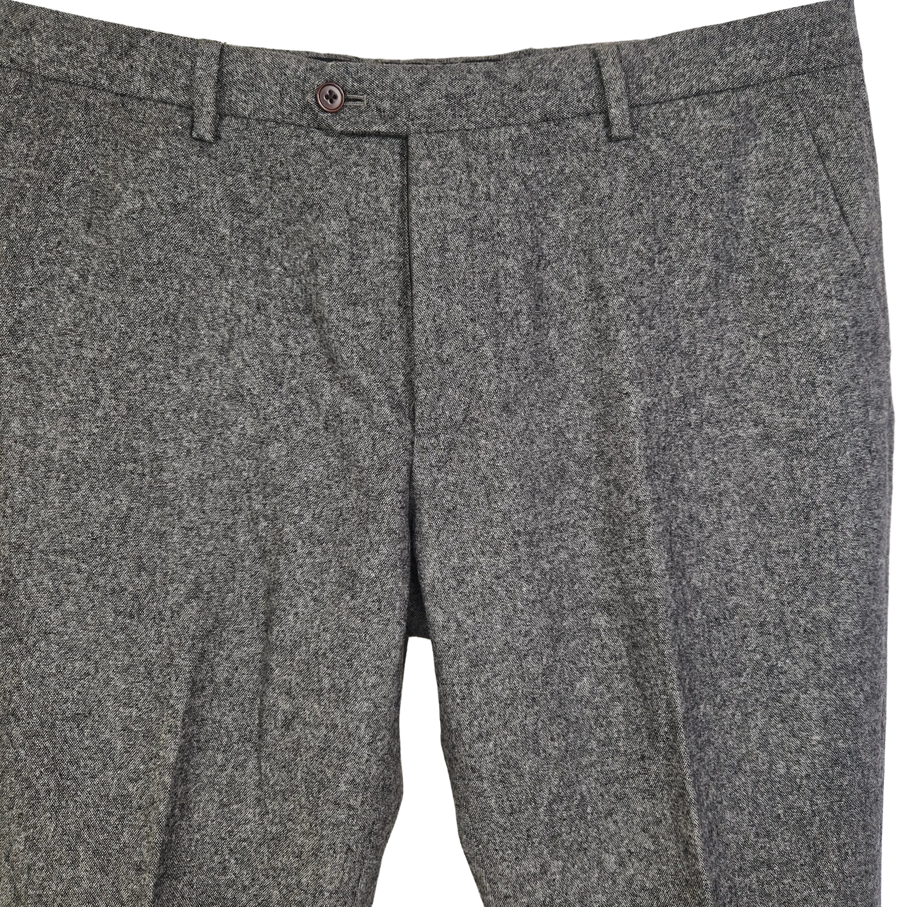 Grey wool blend formal trousers from Next featuring a classic fit and a flat front design.