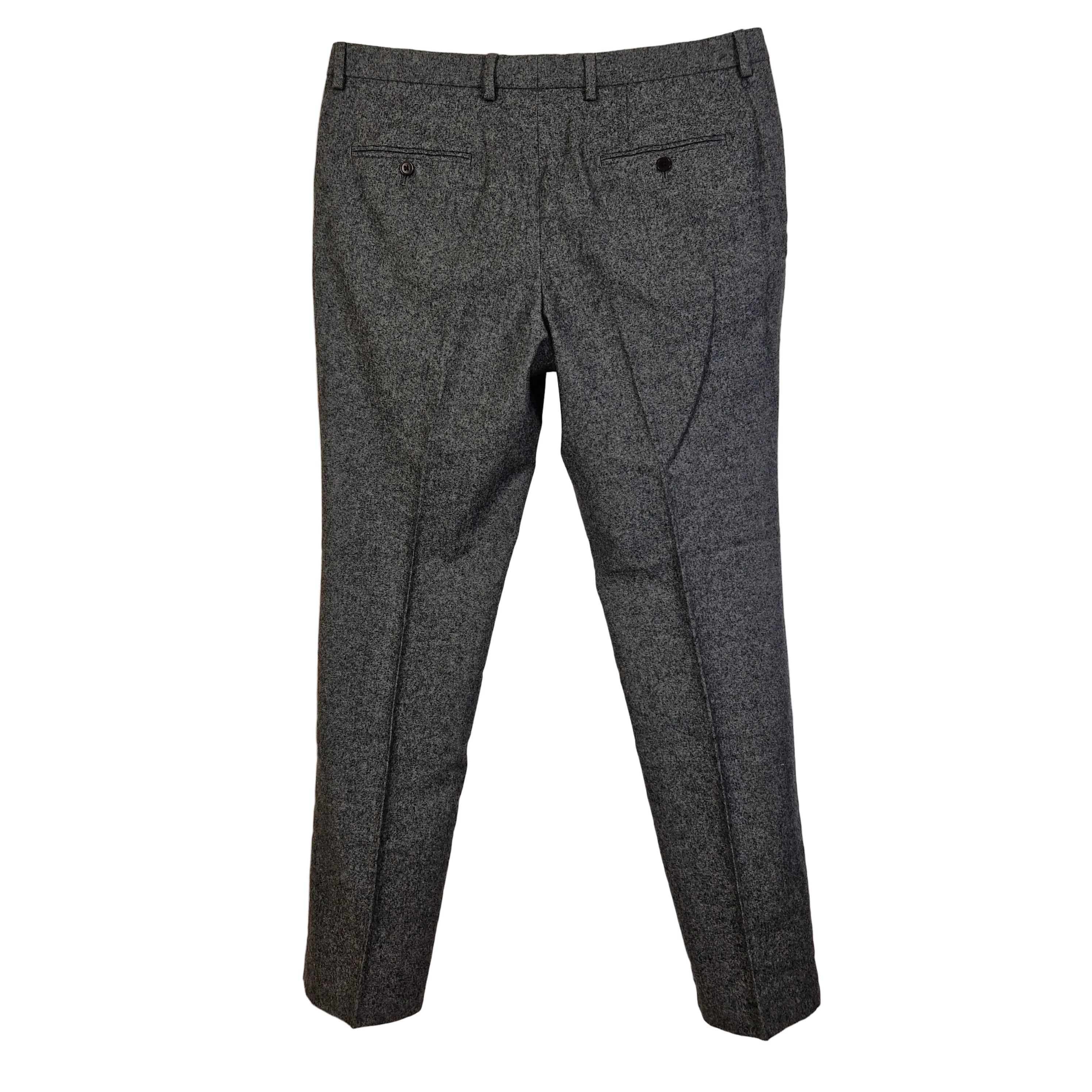A pair of grey wool blend formal trousers from Next featuring a classic fit and back pockets.