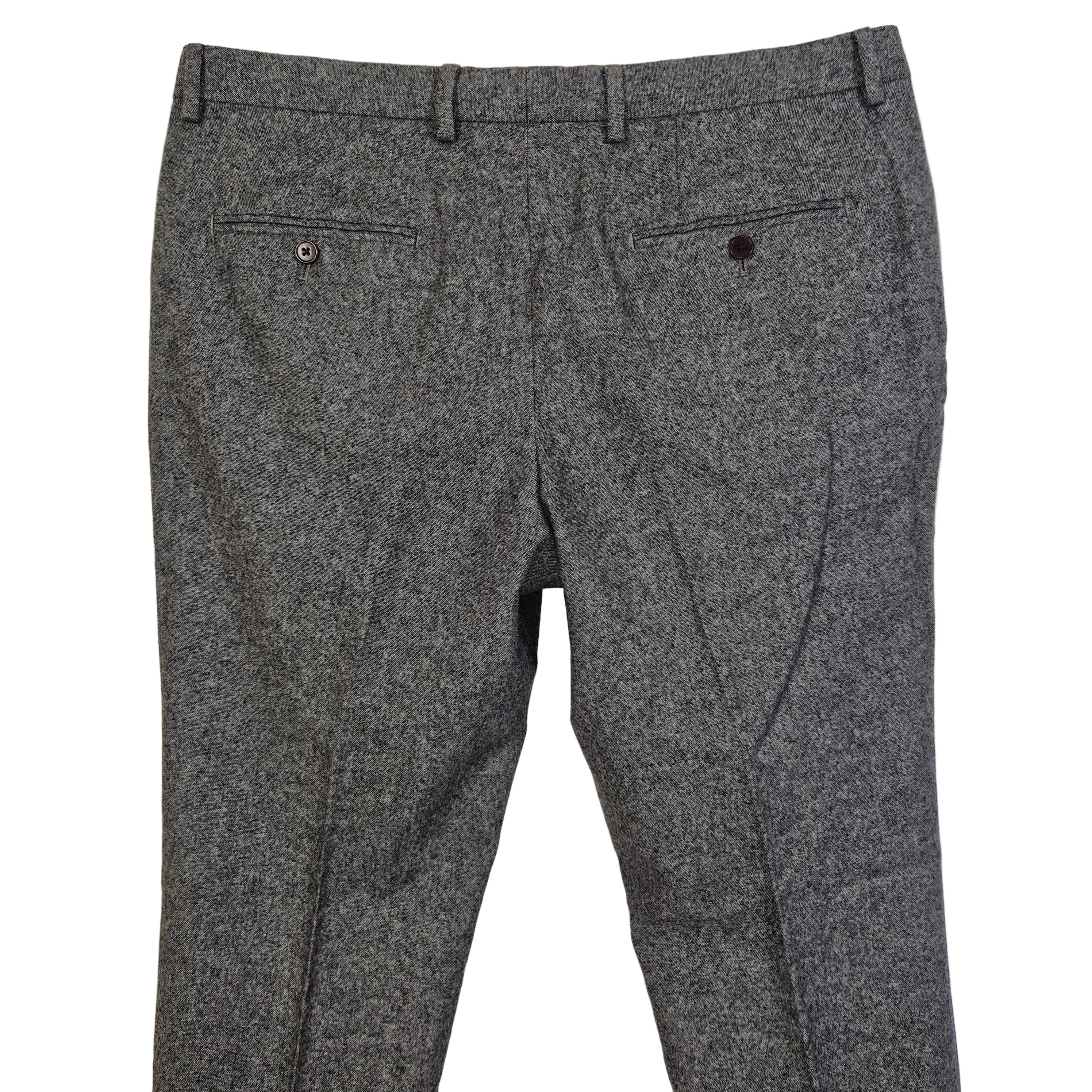 Next men's grey wool blend formal trousers with a classic fit and two buttoned back pockets.