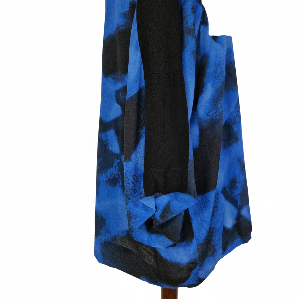 A Kin by John Lewis women's tunic featuring a blue and black abstract print and short sleeves.