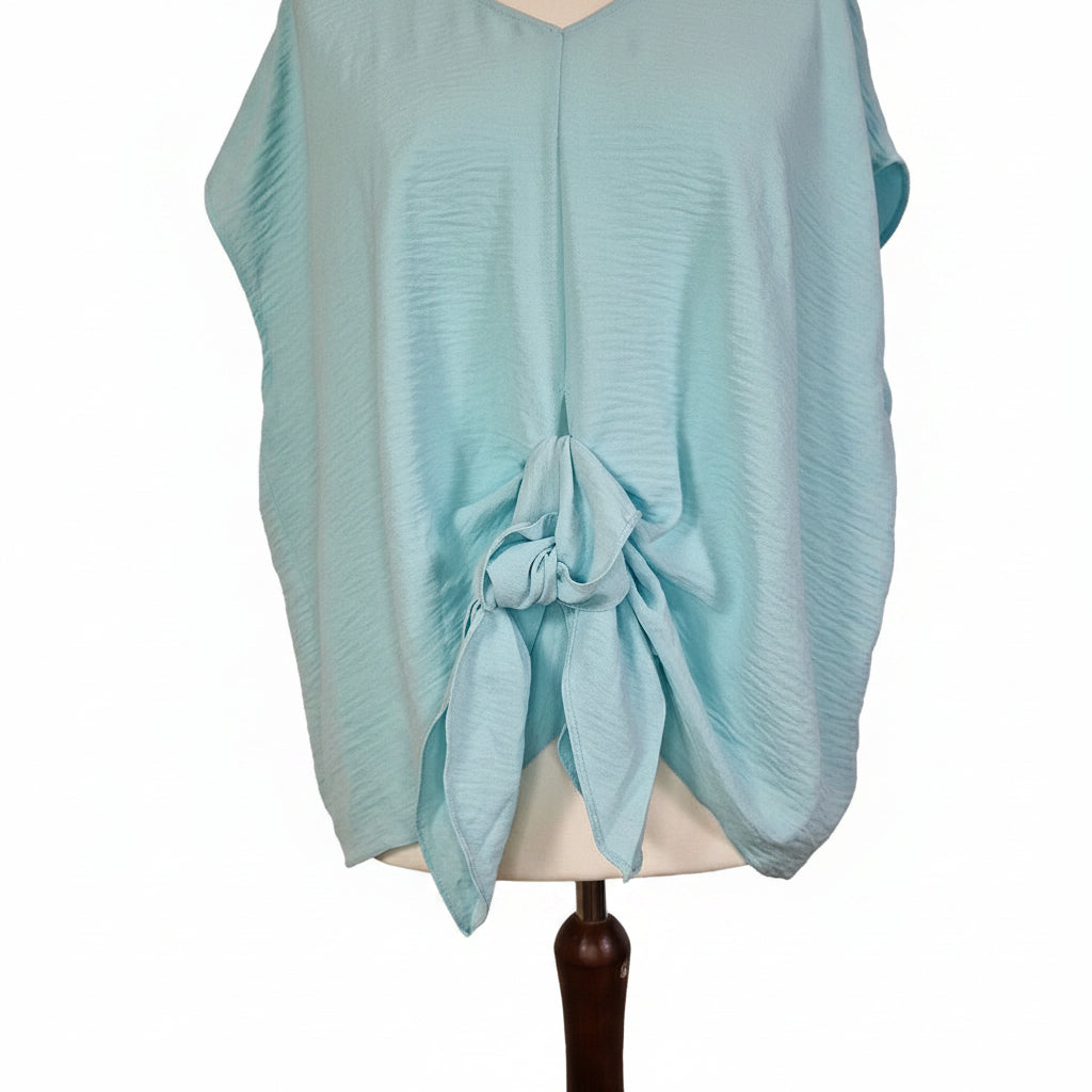 A light blue George women's blouse featuring a V-neck and a tie-front detail.