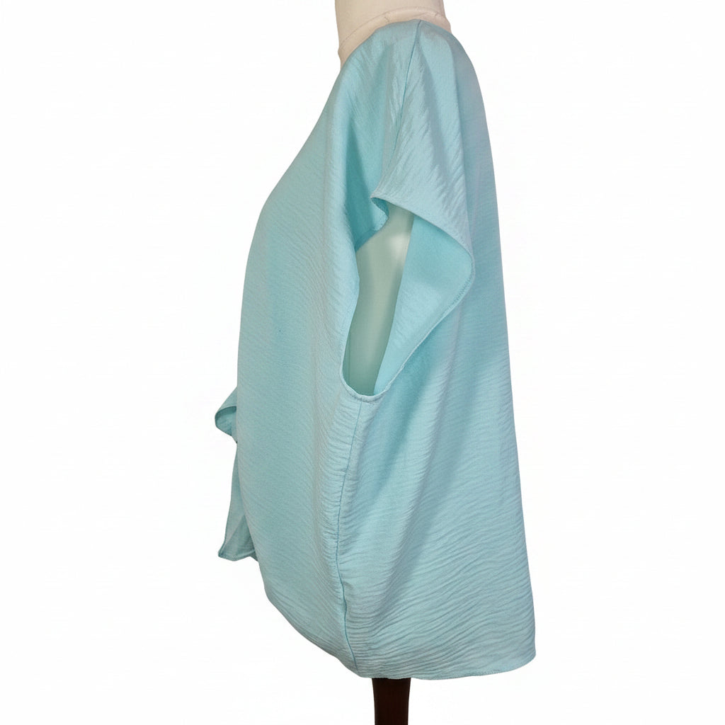 A light blue George women's blouse with a tie-front V-neck and short sleeves.