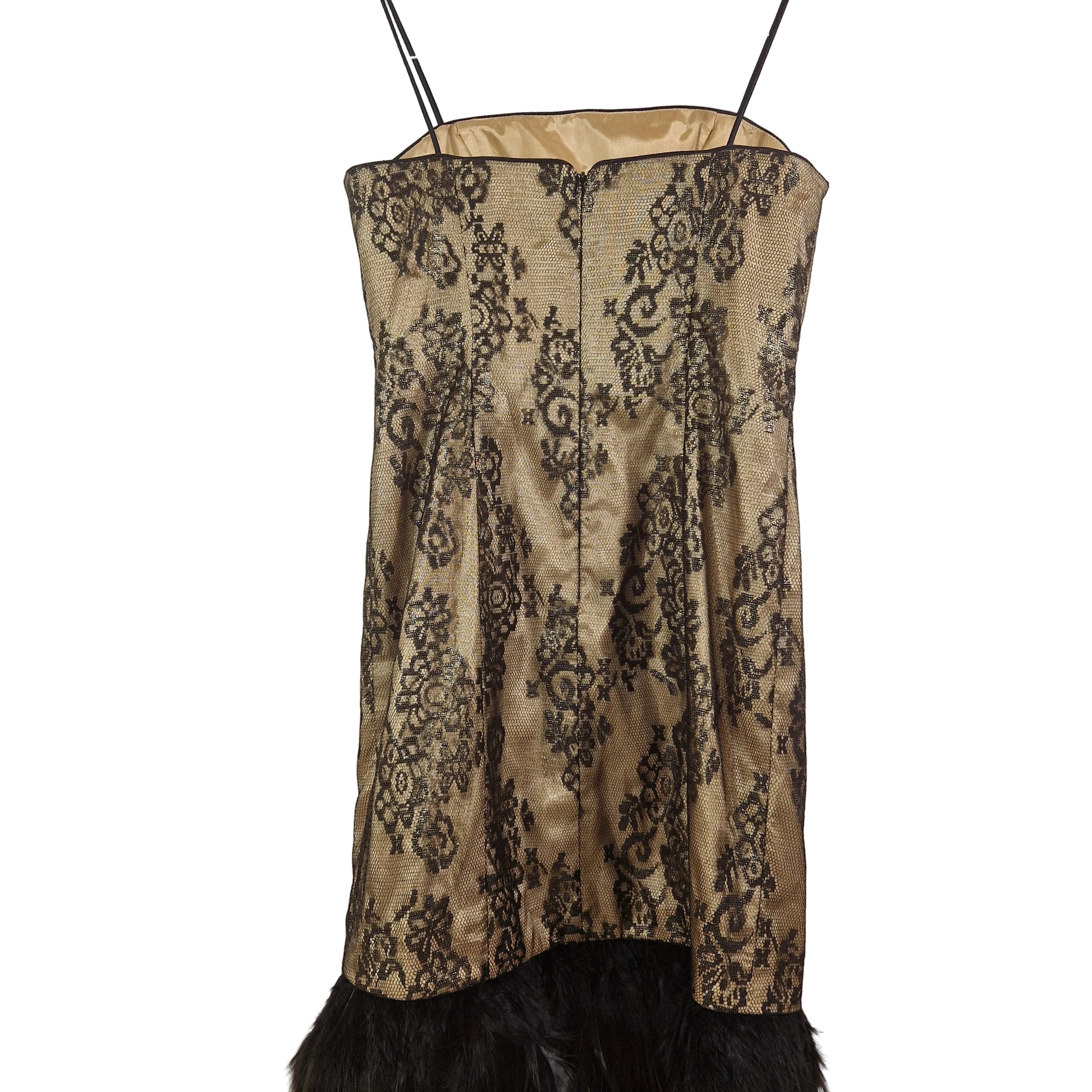 Black lace dress with feathered hem on a white background