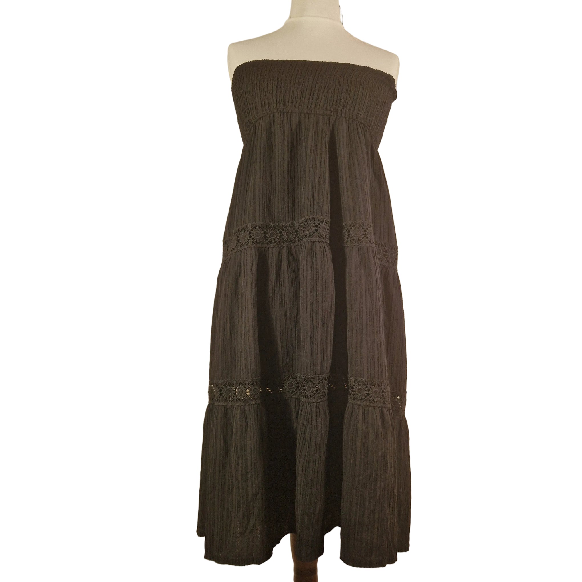 Preloved black sleeveless dress with smocked bodice and lace hem; lightweight polyester pull-on style