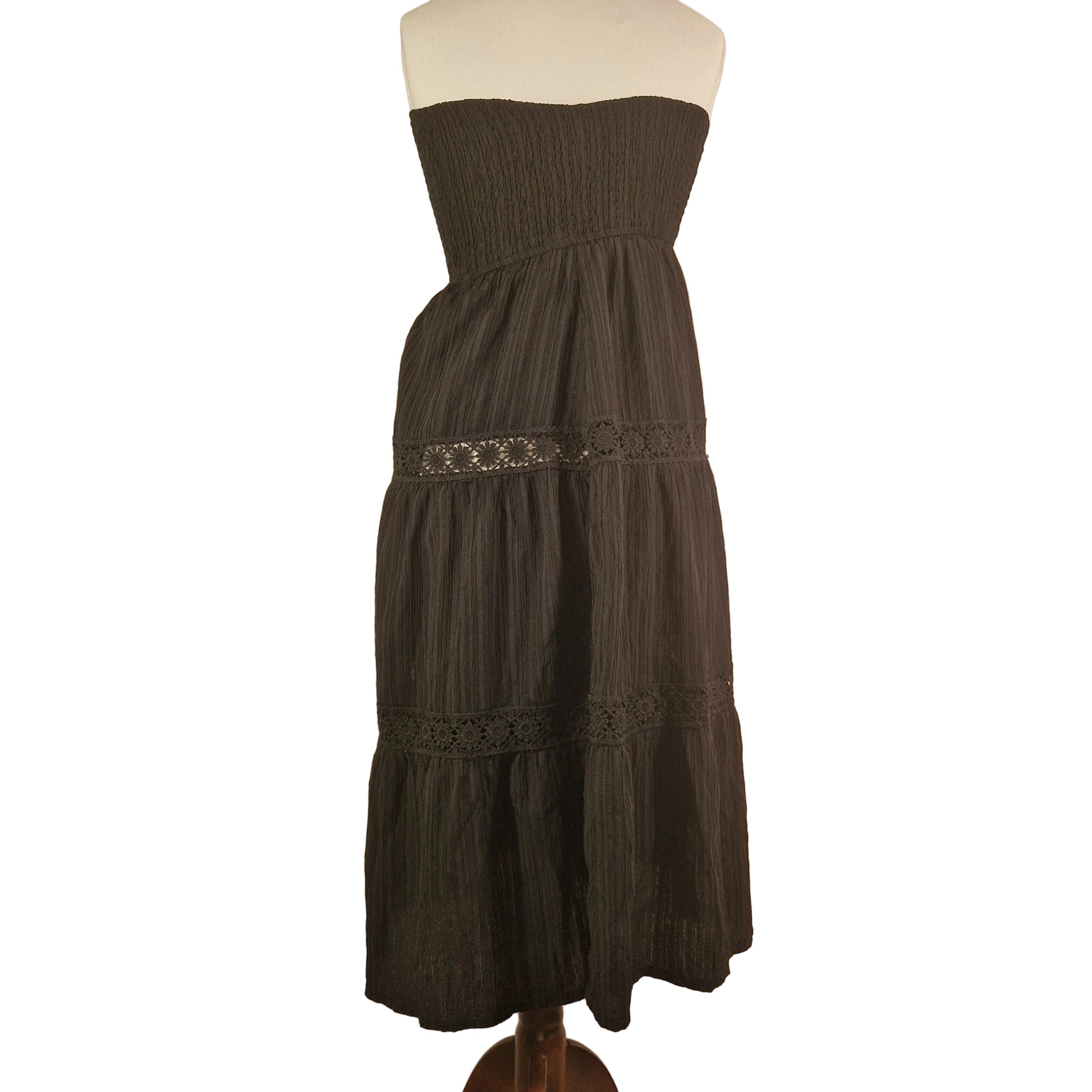 Black sleeveless Shein dress, size L, smocked waist with lace hem on mannequin.
