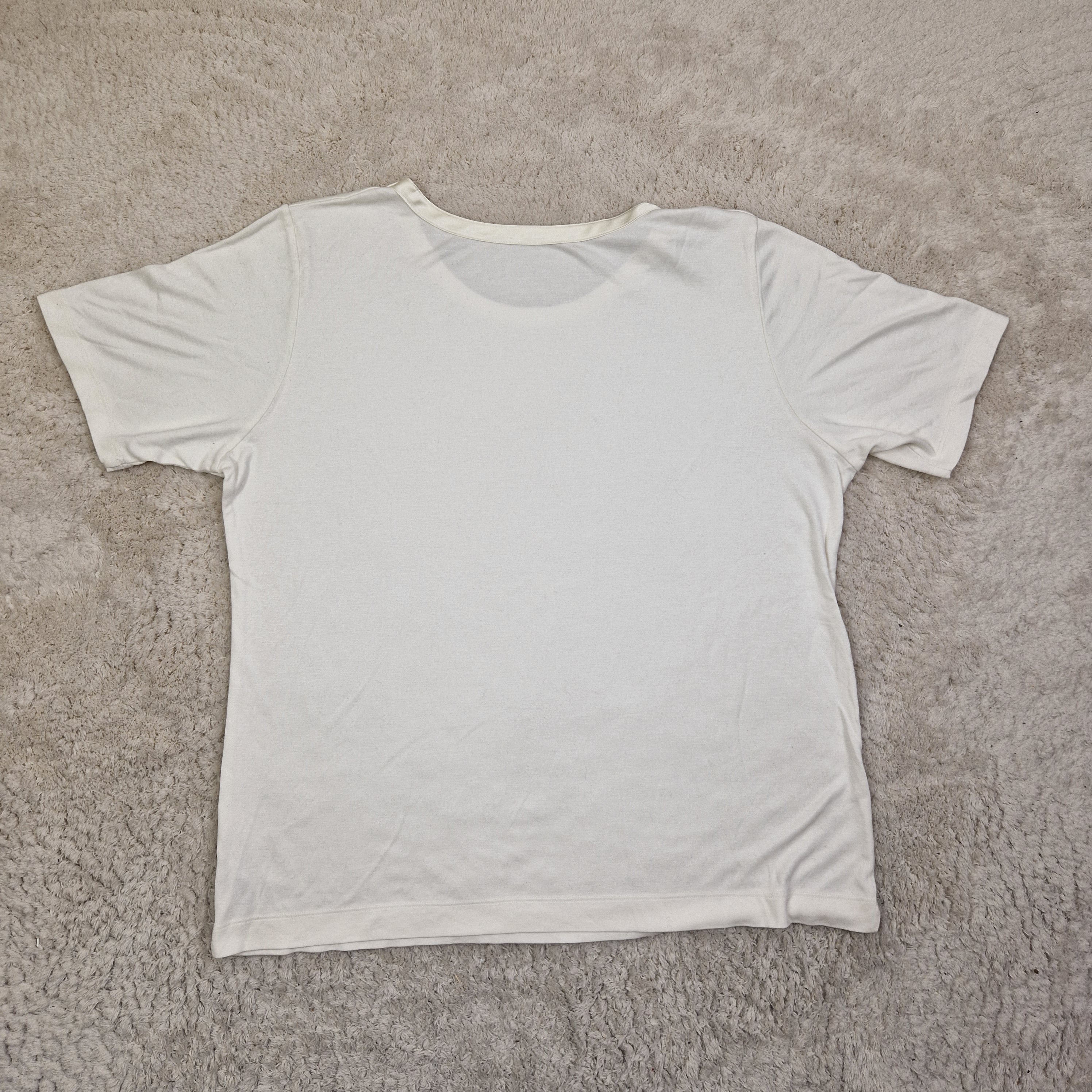 White pillowcase on a textured gray surface
