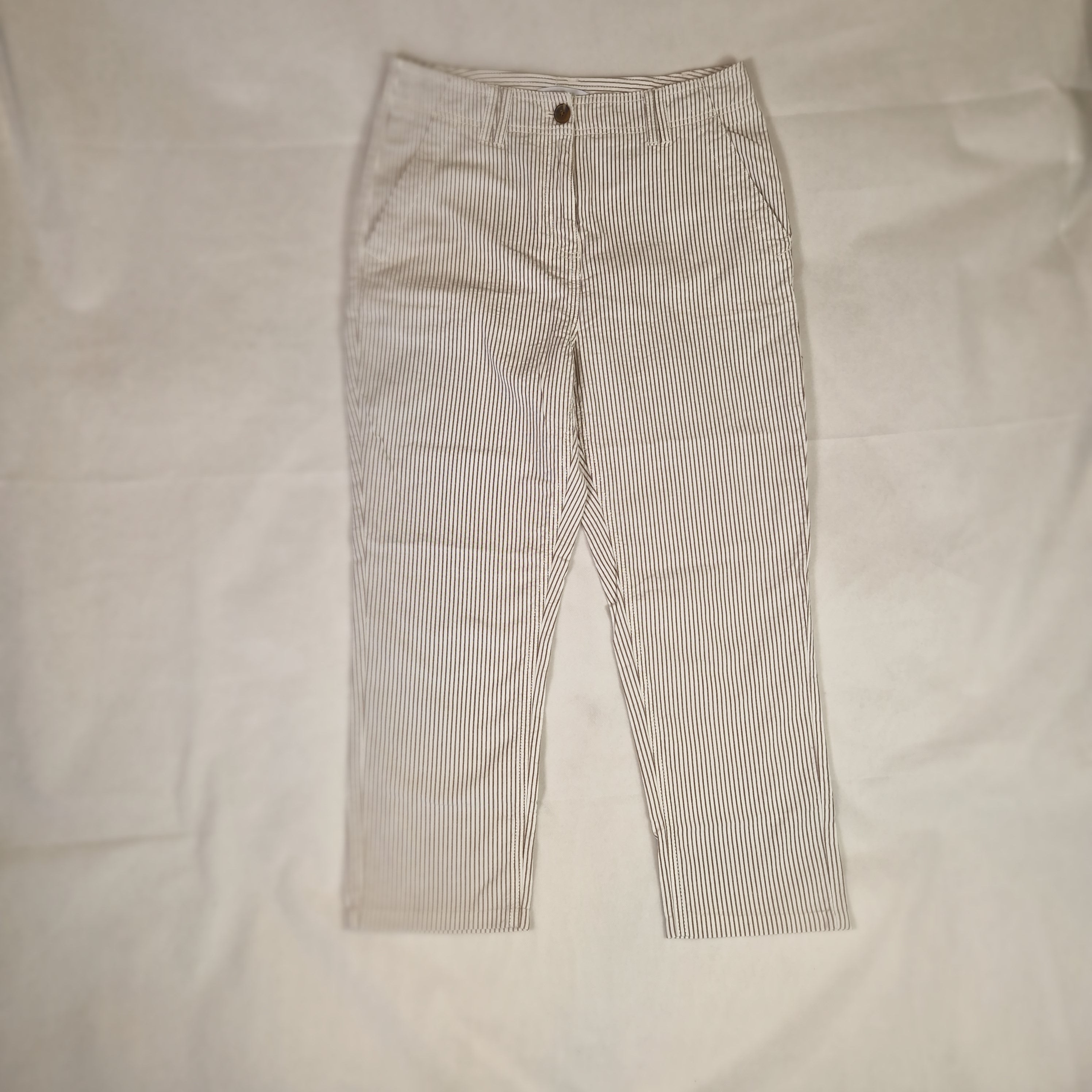 Striped pants on a light beige background