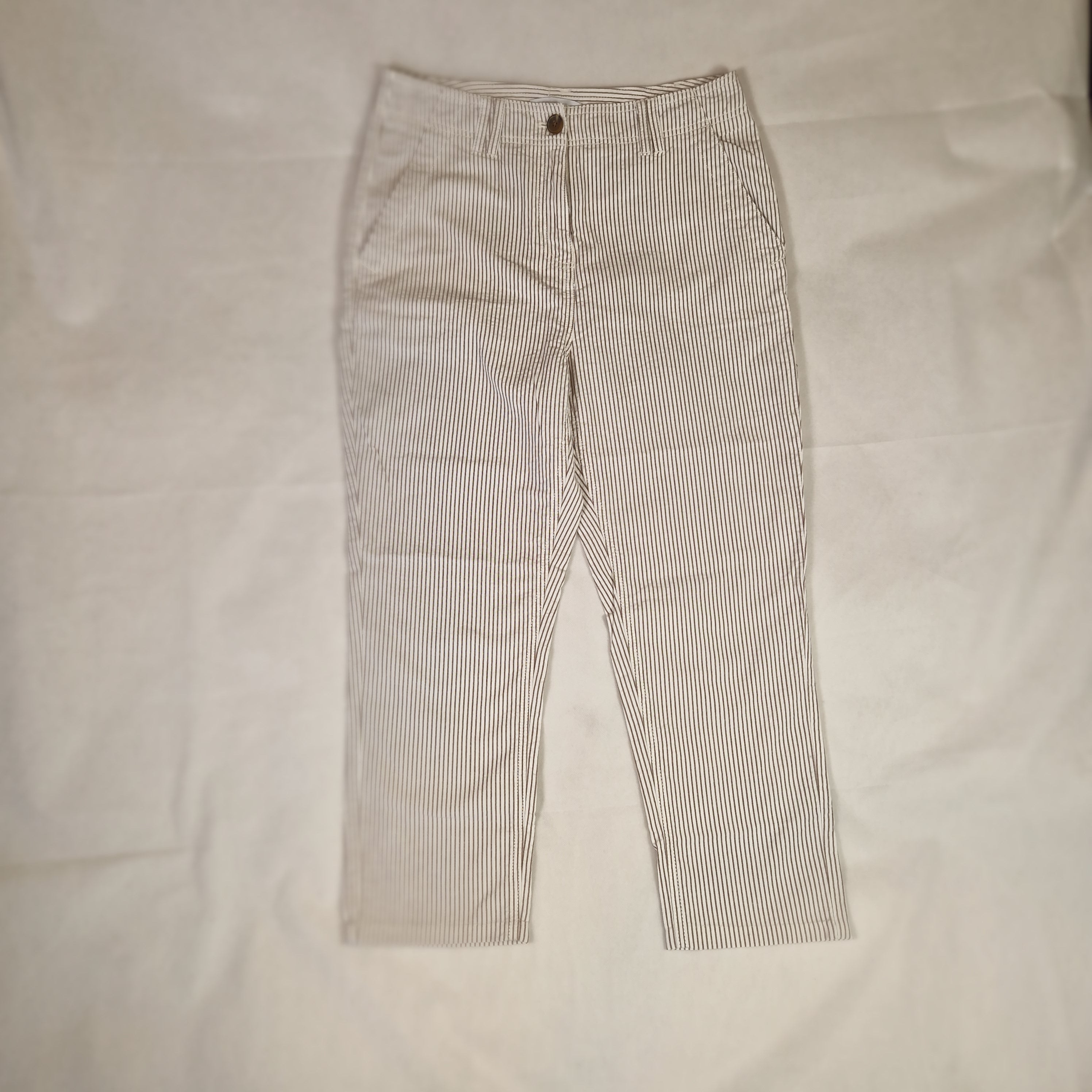 Striped pants on a light gray background