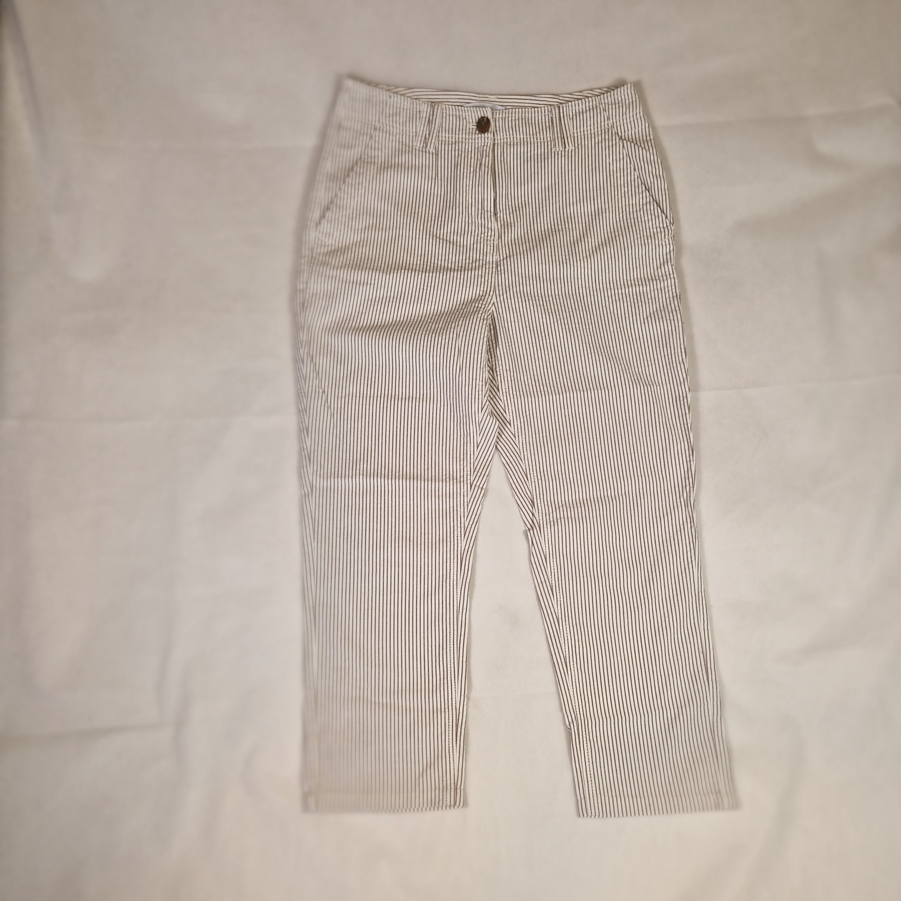 Striped pants on a light gray background
