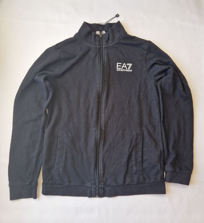 A black EA7 Emporio Armani junior zip-up bomber jacket with a stand-up collar and logo branding.