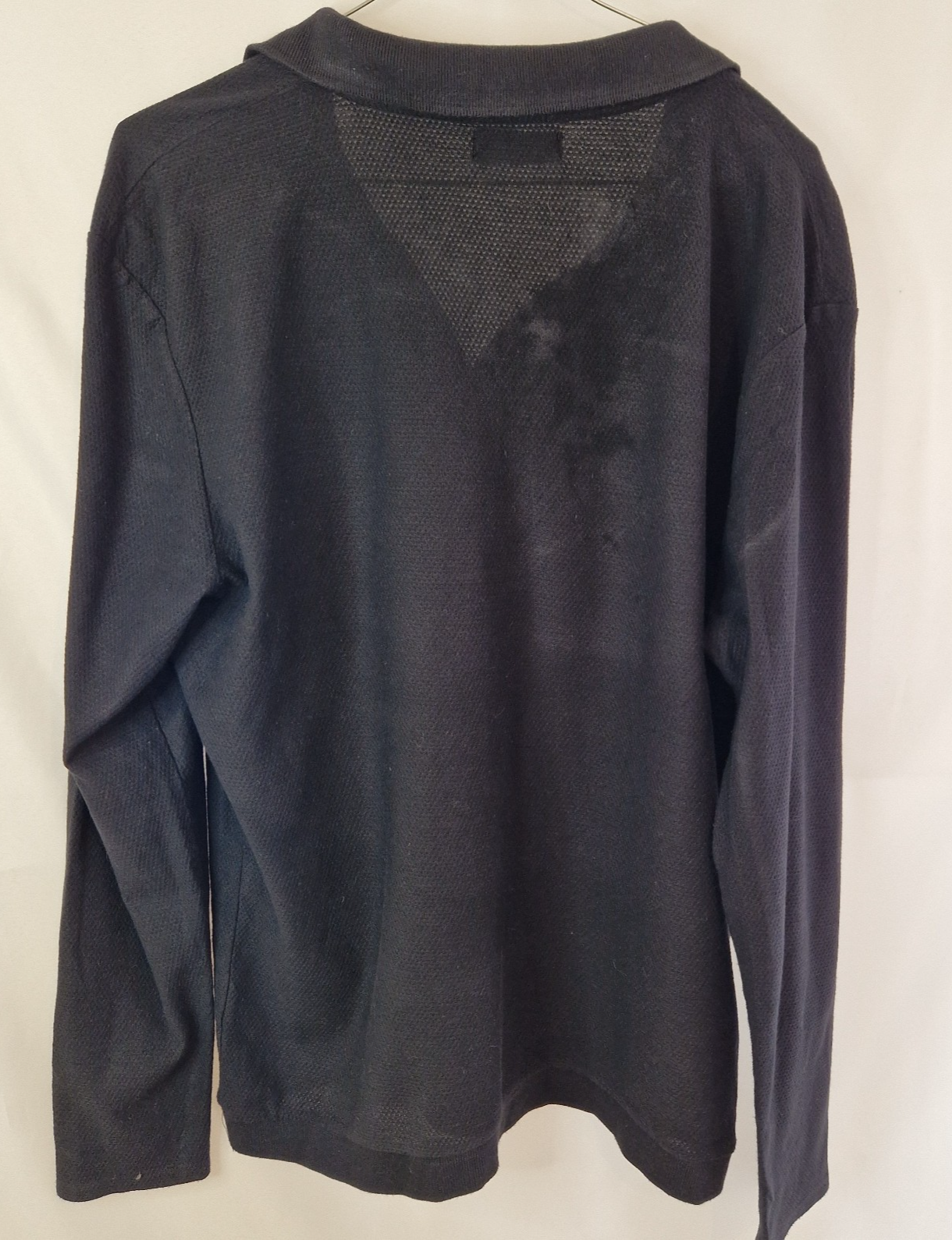 A black Zara Man slim fit cotton knit sweater with a crew neckline.