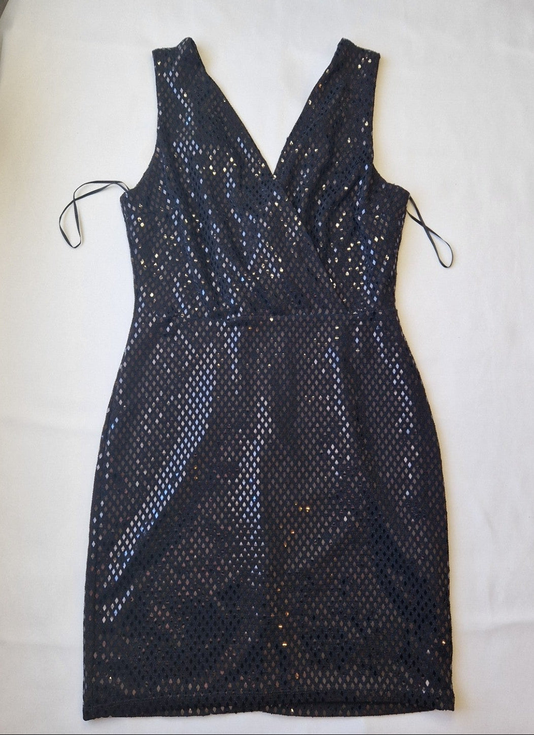 A black sleeveless bodycon dress featuring a V-neckline and an all-over sequin diamond pattern.