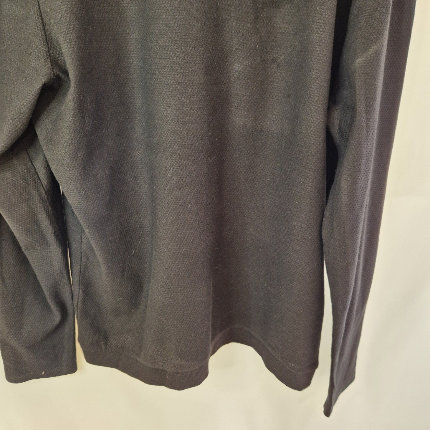 A black Zara Man slim fit crewneck knit sweater made from cotton.