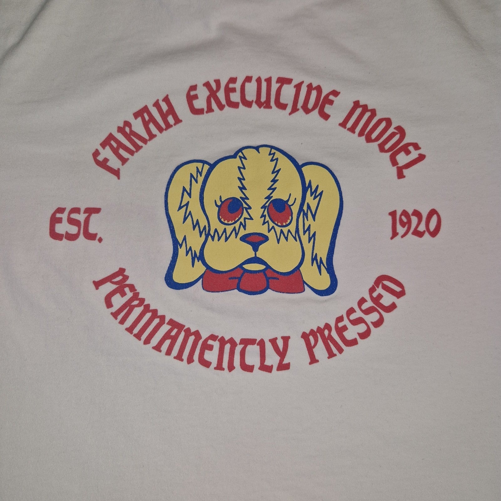 A white Farah t-shirt featuring a graphic of a yellow dog with red text reading Executive Model.
