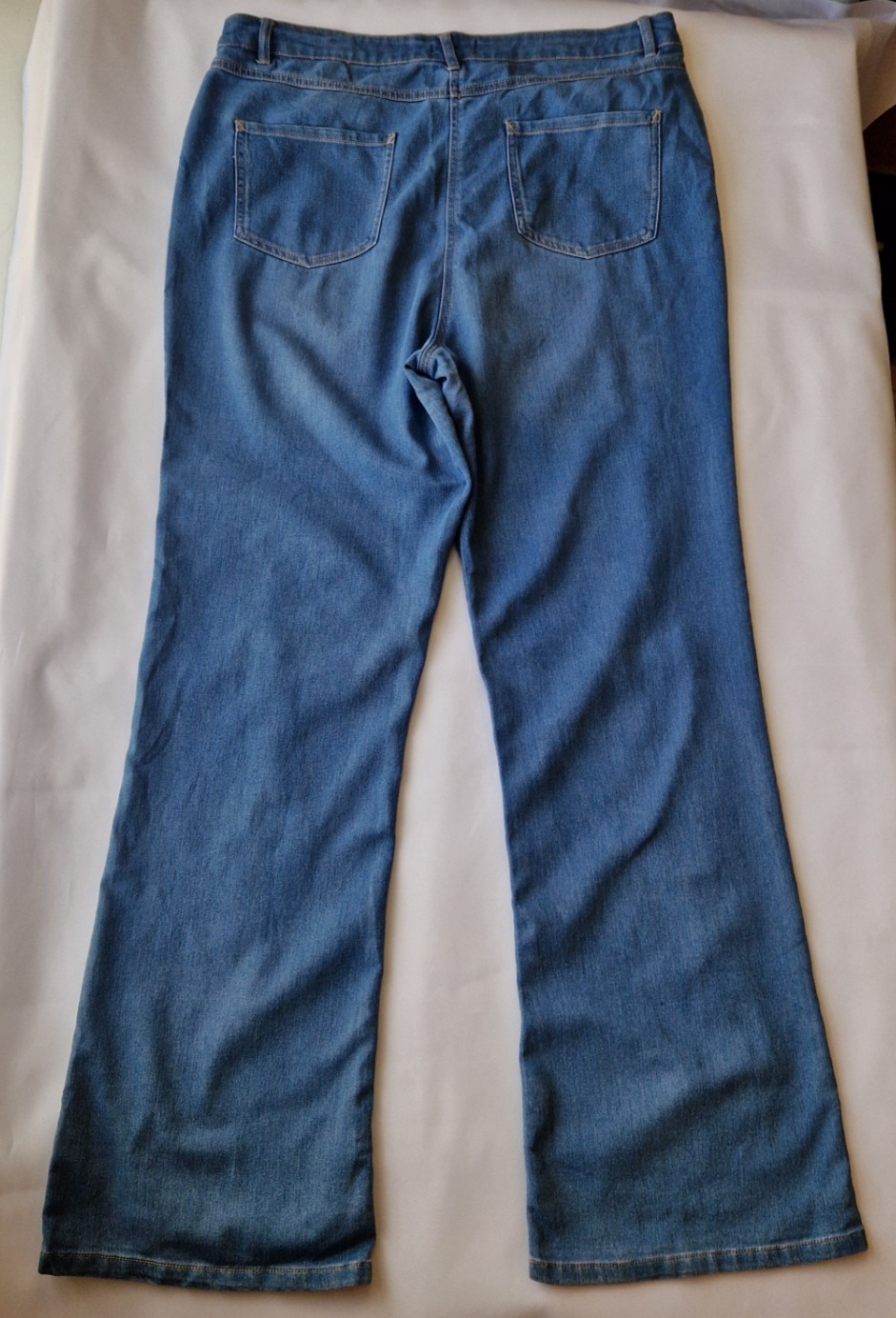 Papaya women's high-rise wide leg jeans in a medium blue wash with a classic five-pocket design.