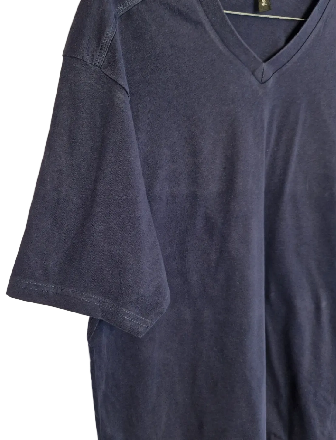 A blue Donnay men's V-neck t-shirt made from soft cotton jersey.