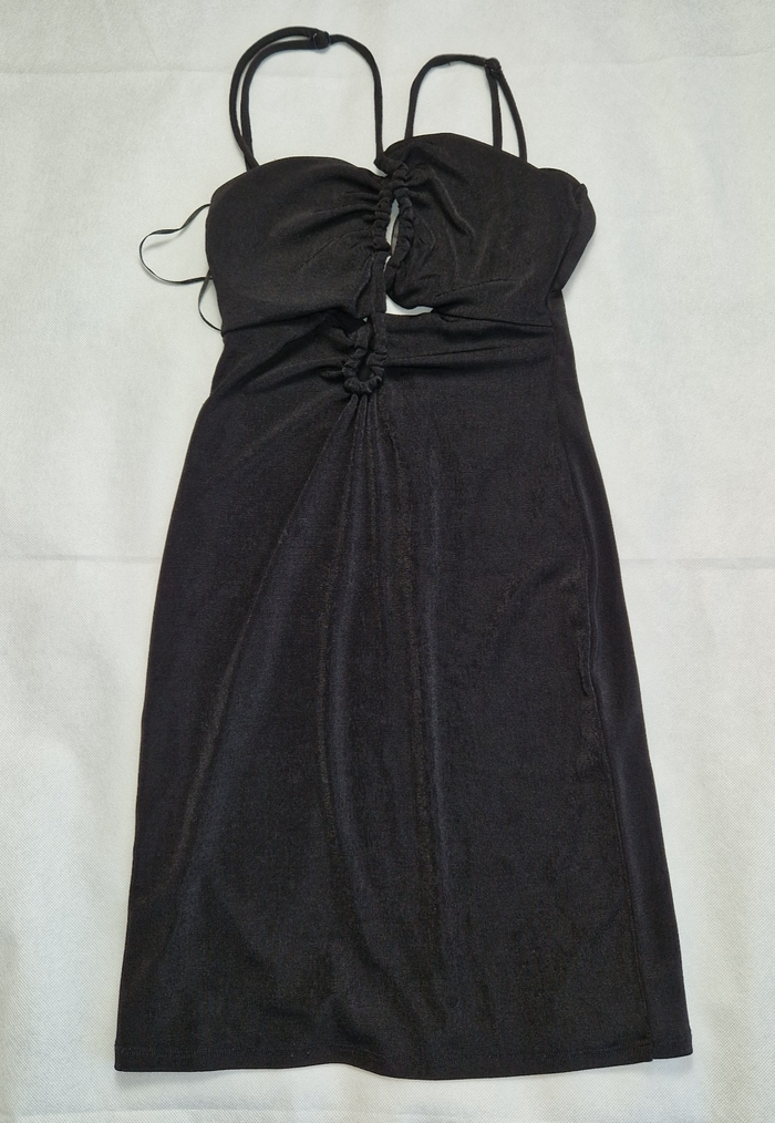 A black Bershka strappy crop top with integrated padding and a gathered front design.