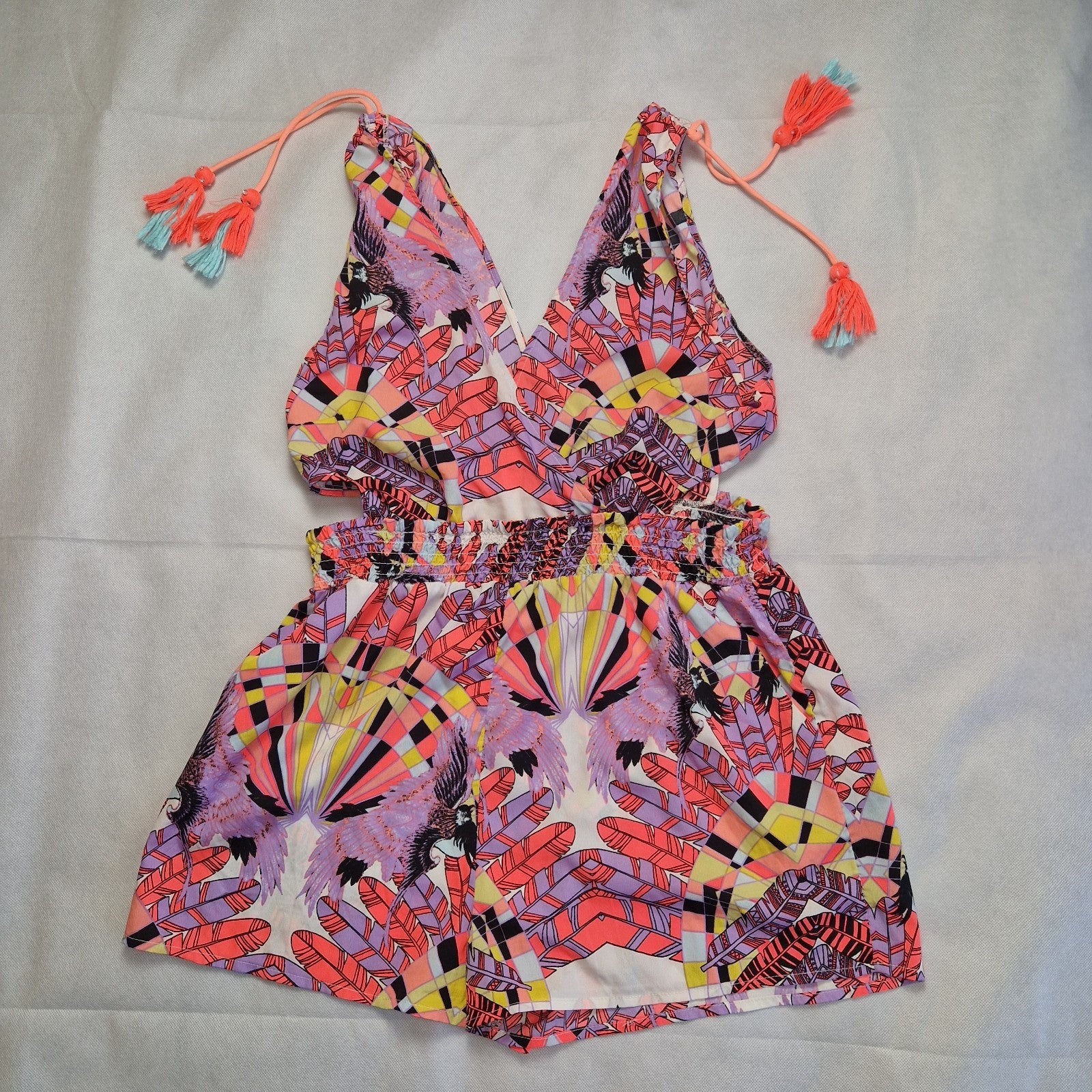 River Island multicoloured floral print playsuit with an elasticated waist and tassel tie straps.