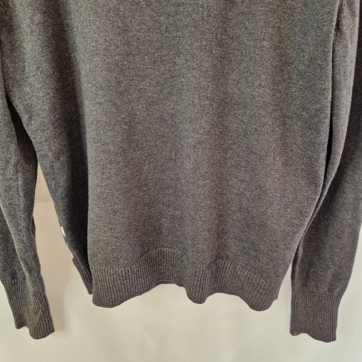 A grey Papaya women's long-sleeved jumper in a soft knit fabric with a heart pattern.