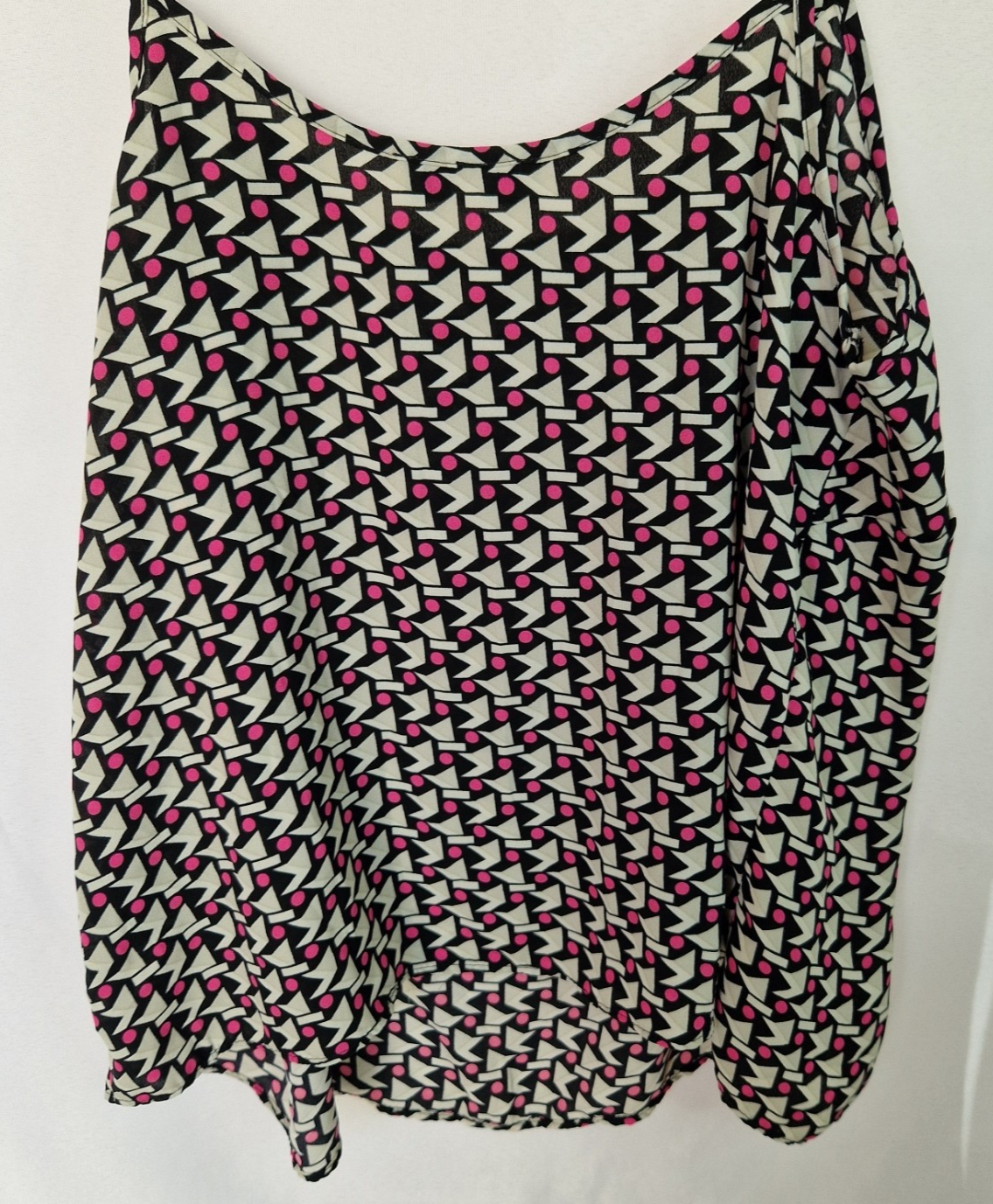 A sleeveless Papaya cami top in chiffon featuring a geometric pattern in pink, black, and cream.