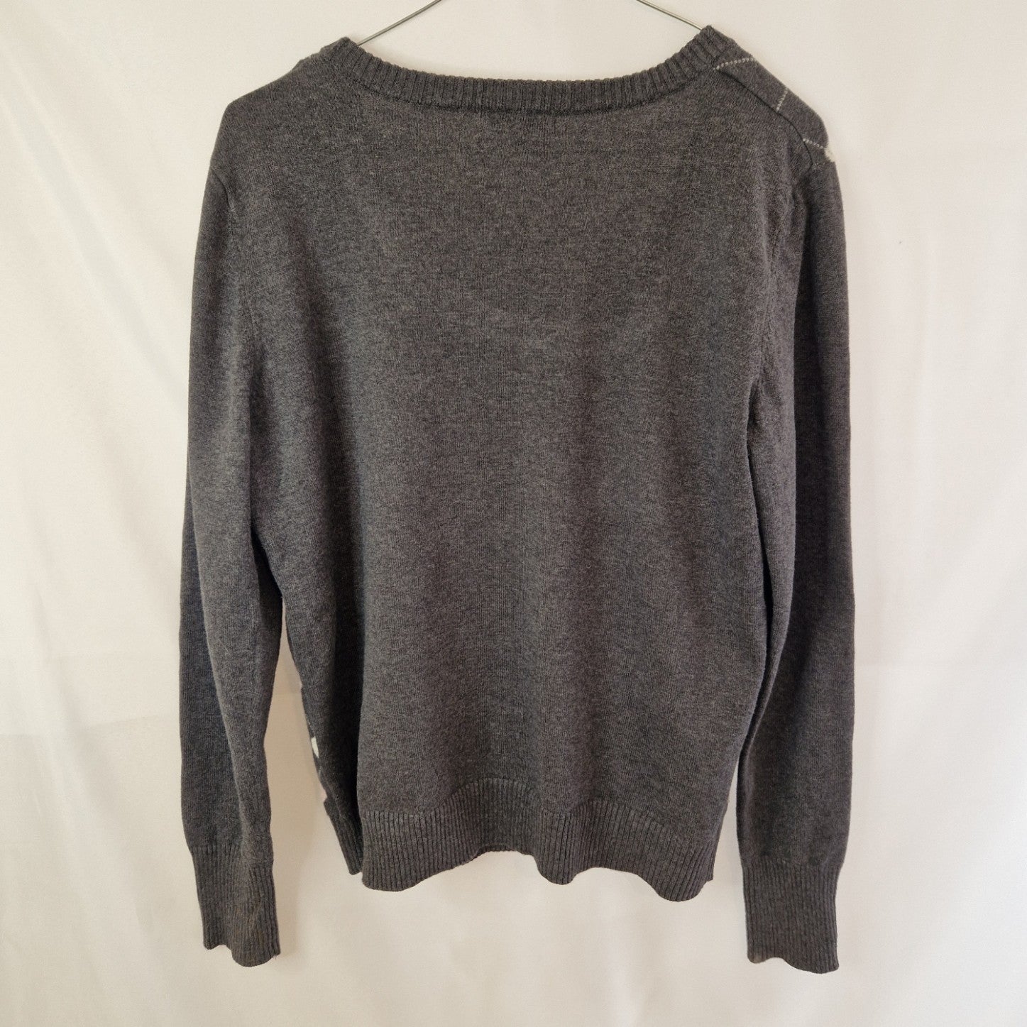 A grey Papaya women's long-sleeved jumper with a round neck and a subtle heart pattern.