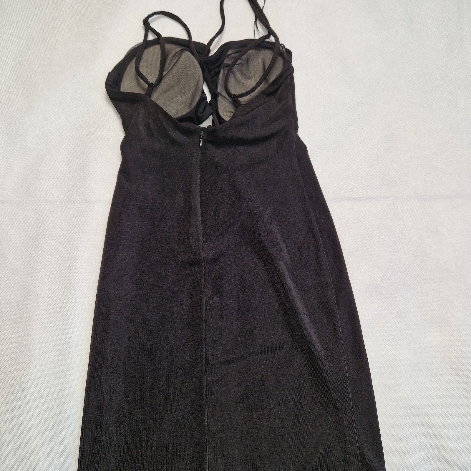 Bershka black off-shoulder crop top with padded cups and thin spaghetti straps.