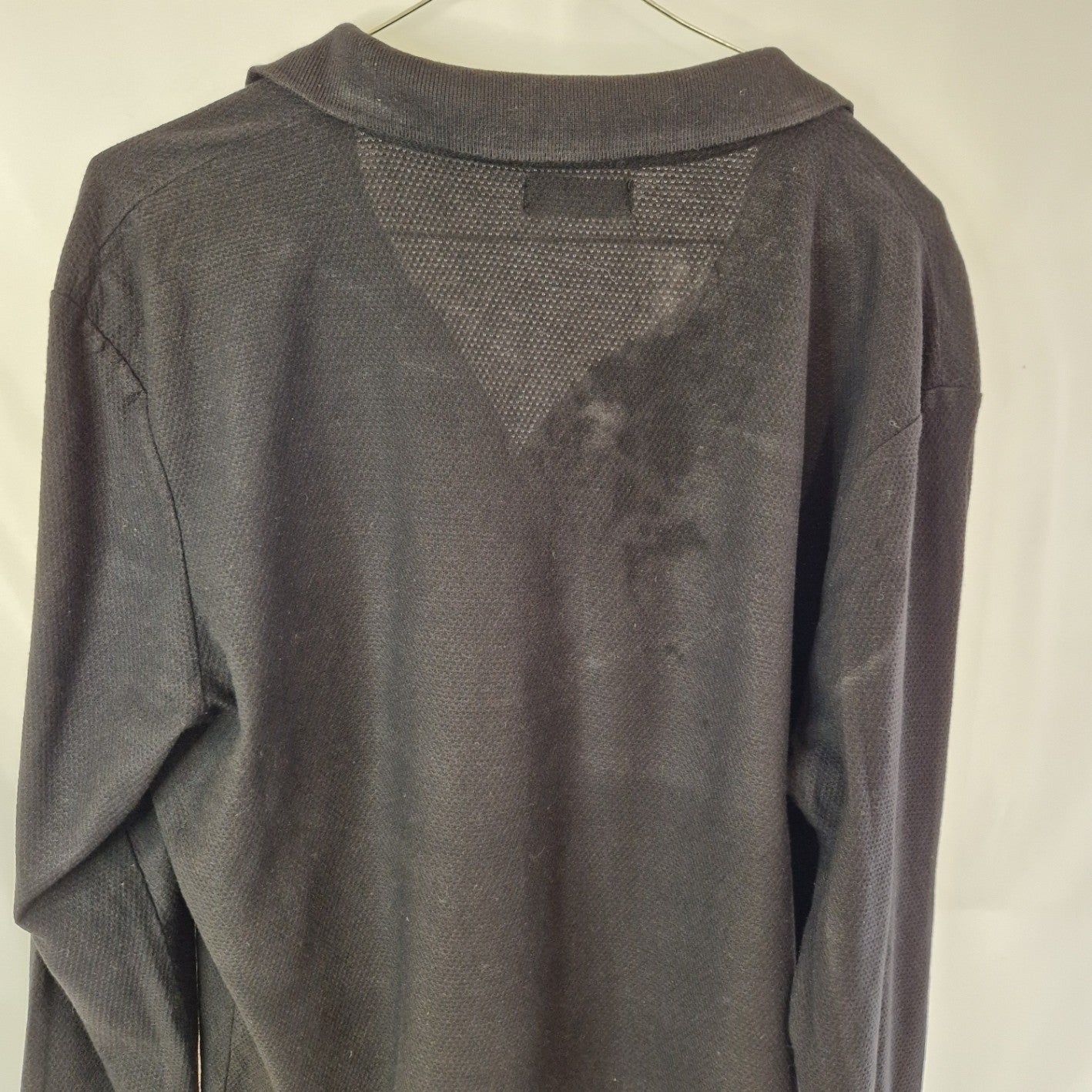 A black Zara Man slim fit cotton knit sweater with a crew neckline shown from the back.