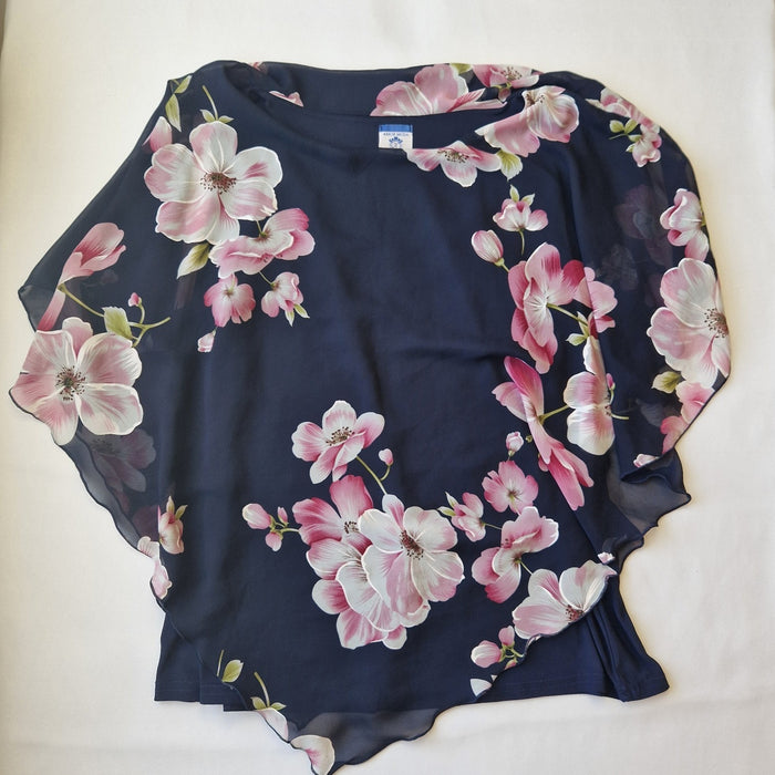 A navy blue chiffon blouse featuring a pink floral print and a scalloped hem.