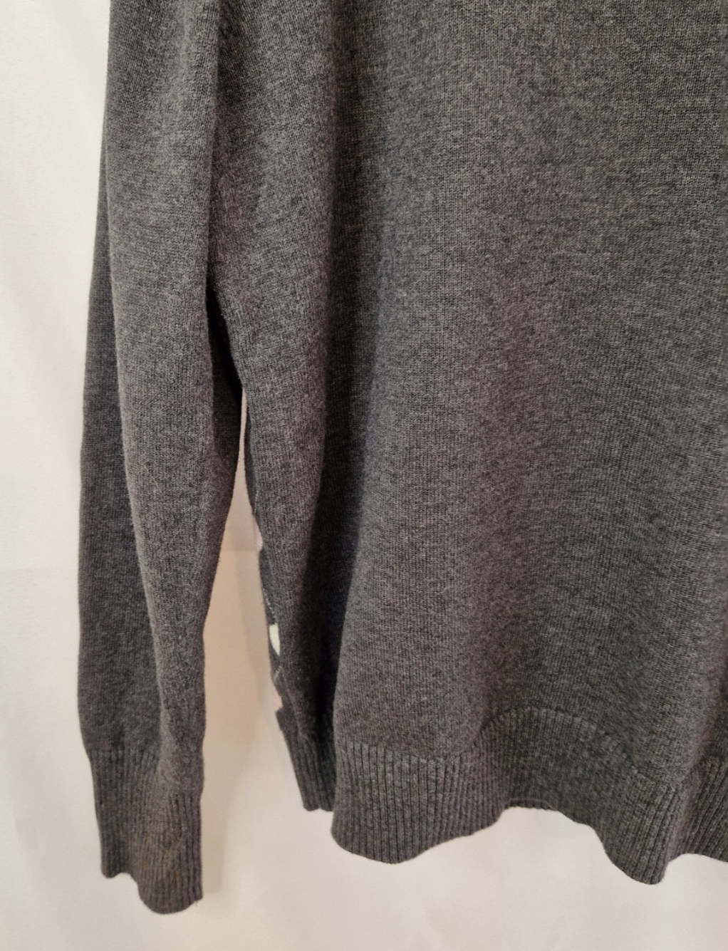 A grey Papaya long-sleeved jumper in a soft knit fabric with a subtle heart pattern.