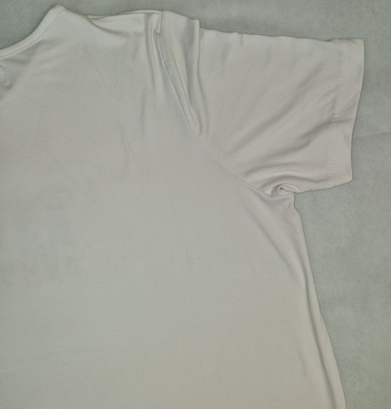 A plain white short-sleeved cotton jersey t-shirt with a round neckline.