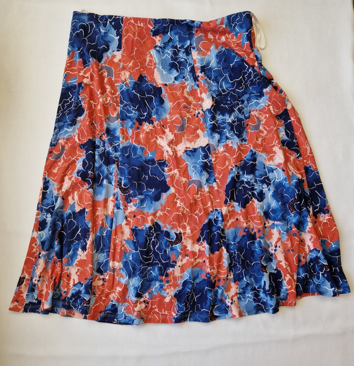 Honor Milburn midi skirt in a multicolour floral print with an asymmetric hem.