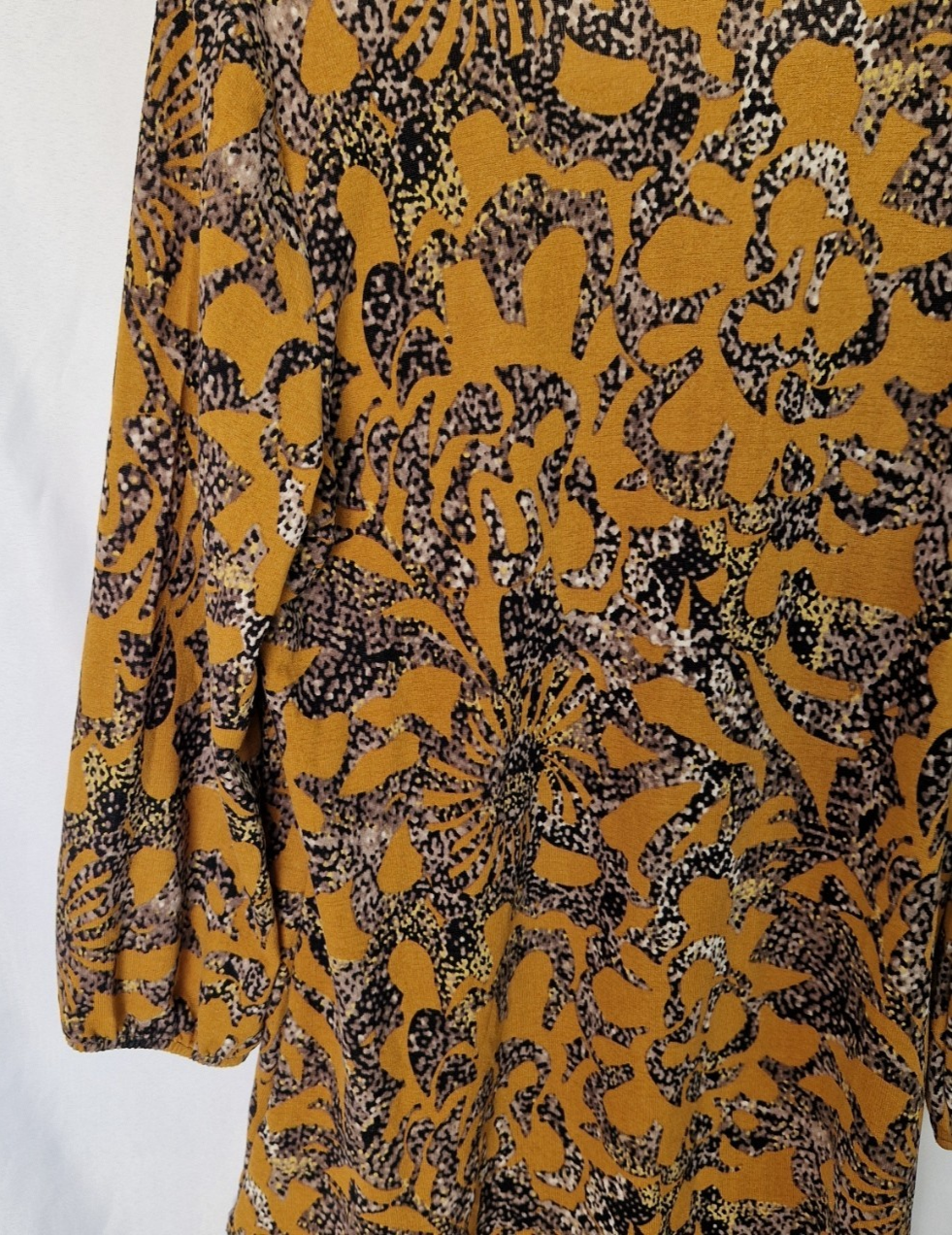 Klass yellow long-sleeve tunic top featuring a black and grey abstract floral print.