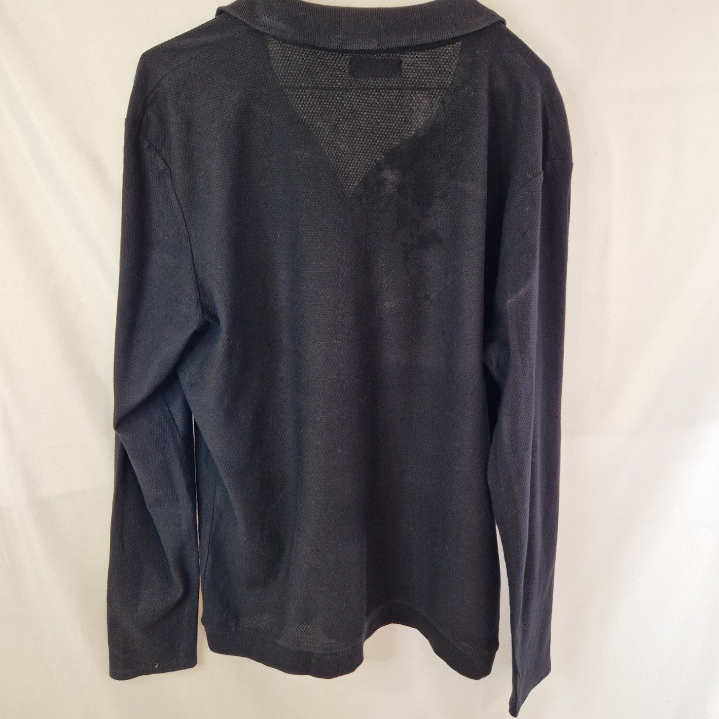 A black Zara Man slim fit cotton knit sweater with a crew neckline.