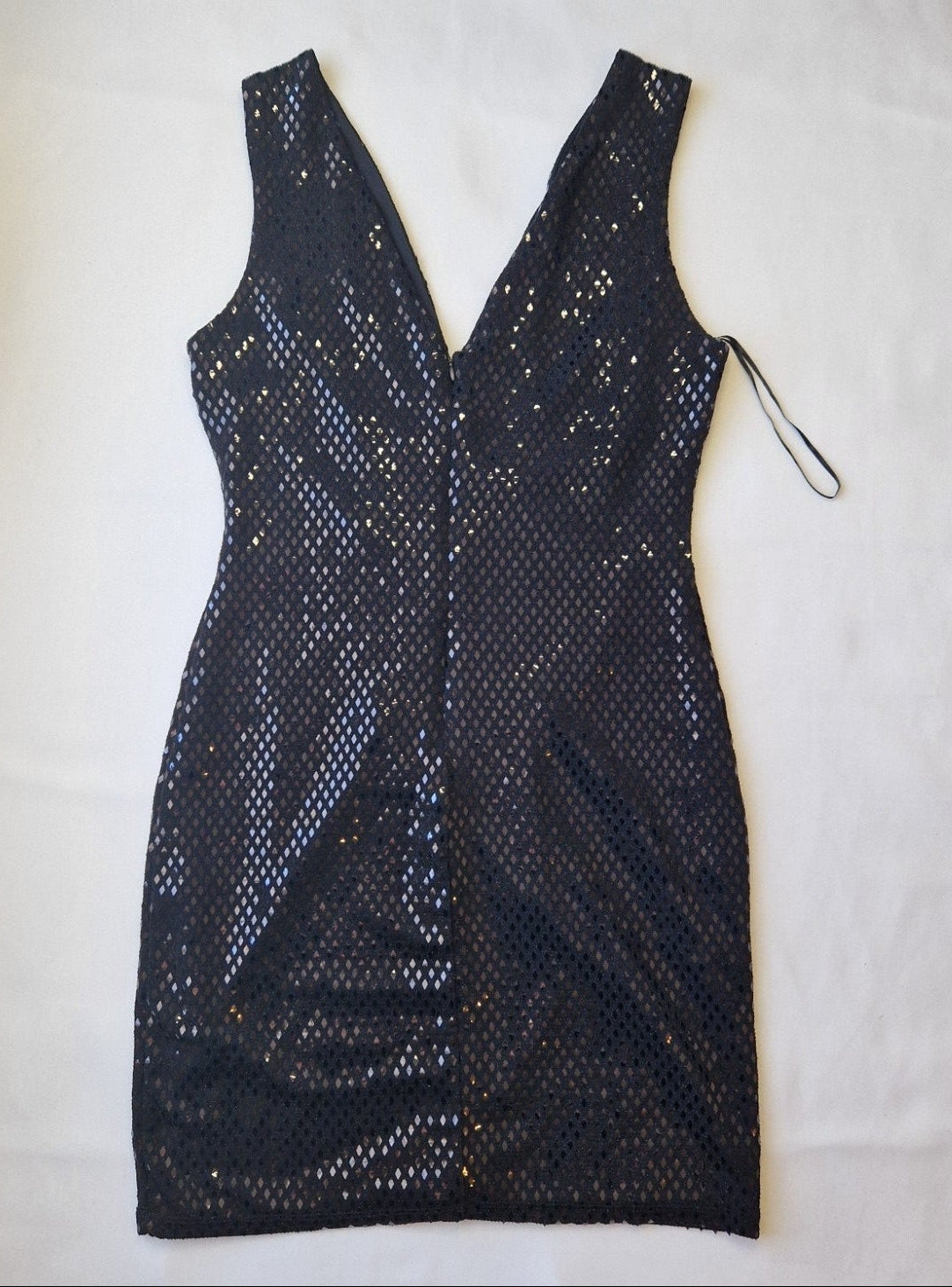 A black sleeveless bodycon party dress featuring an all-over diamond-patterned sequin mesh design.