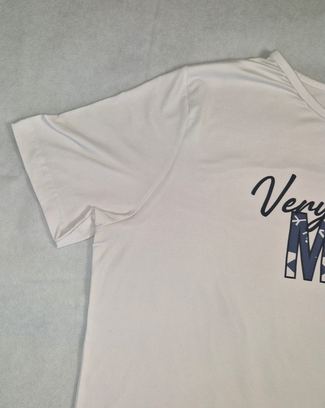A white short-sleeved cotton jersey t-shirt with a round neckline.