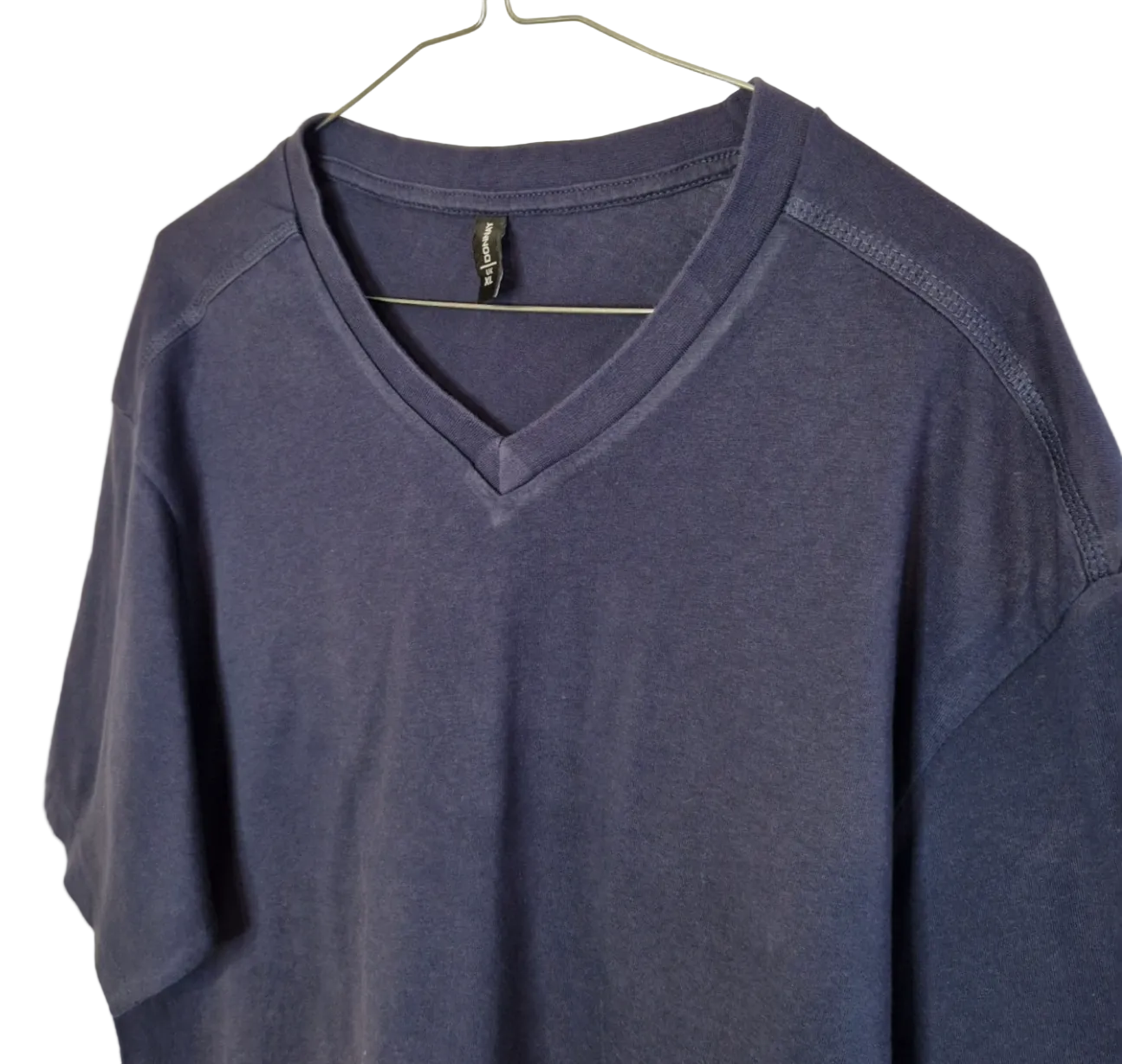 A blue Donnay men's V-neck t-shirt made from soft cotton jersey fabric.