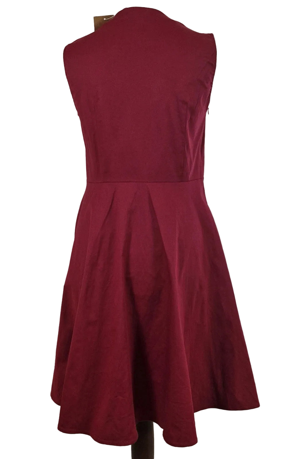 A sleeveless, deep red A-line midi dress made from a cotton blend.