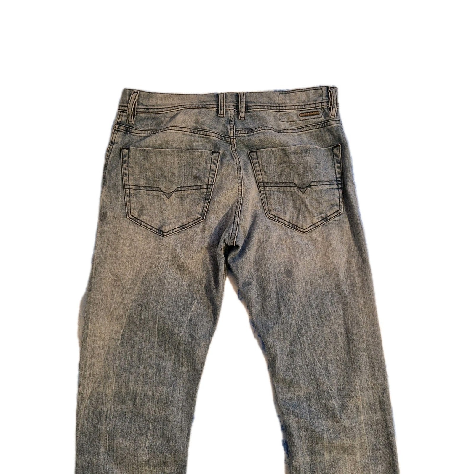 Diesel men's straight fit jeans in a vintage blue denim wash with a classic five-pocket design.