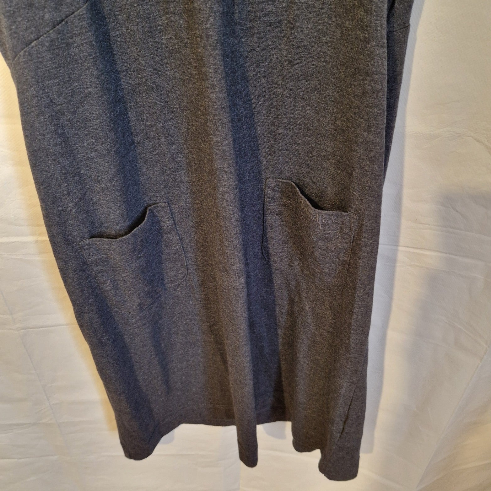A grey Weird Fish midi shift dress featuring a geometric pattern and two front pockets.