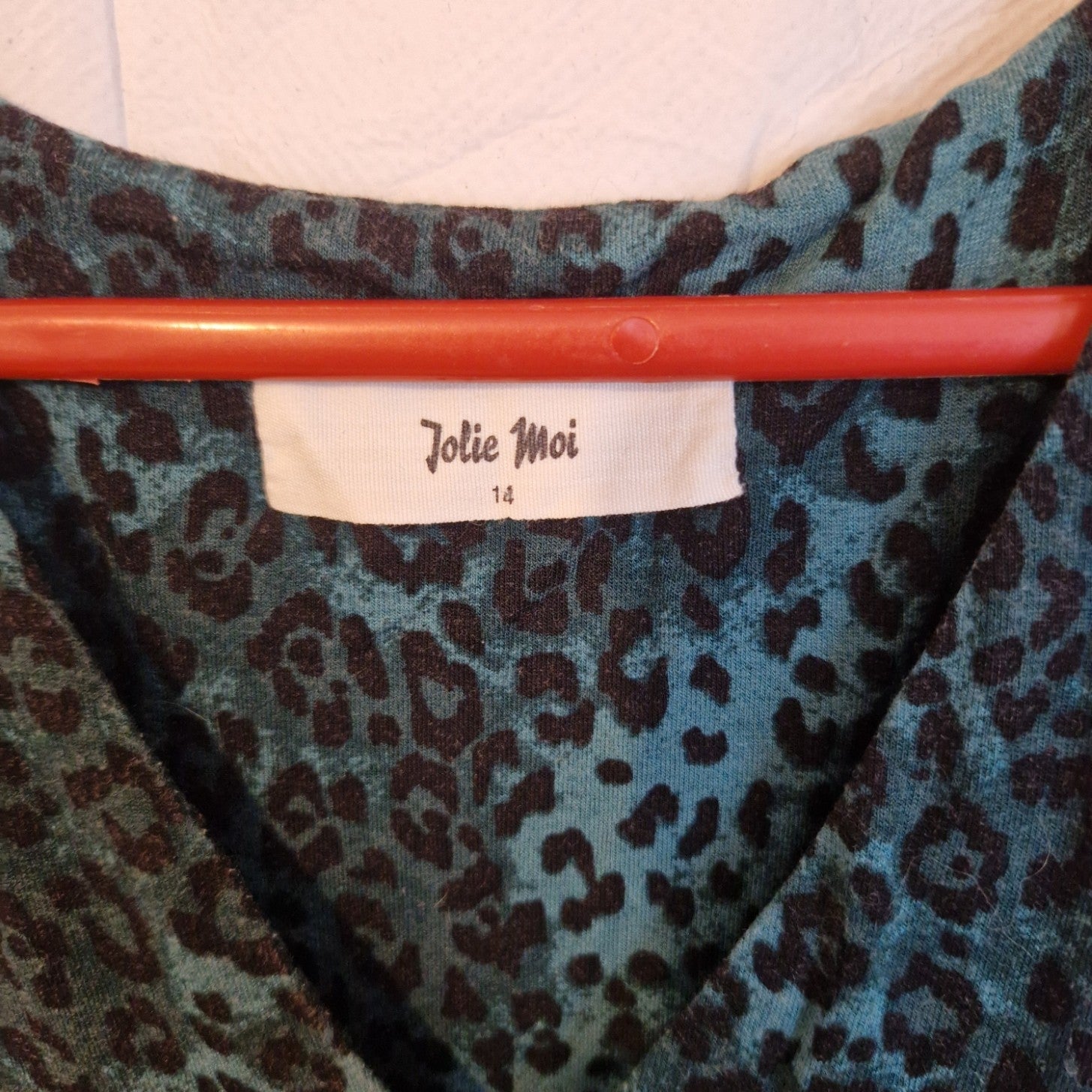 A teal and black leopard print Jolie Moi maxi dress with a size 14 label.