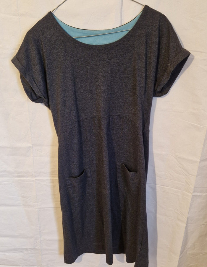 A grey Weird Fish midi shift dress with a round neck, cuffed sleeves, and two front pockets.