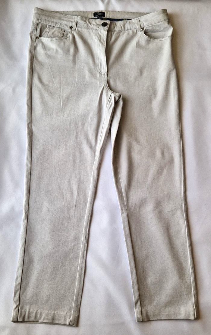 Emreco beige straight leg corduroy chino trousers with a zip and button closure.