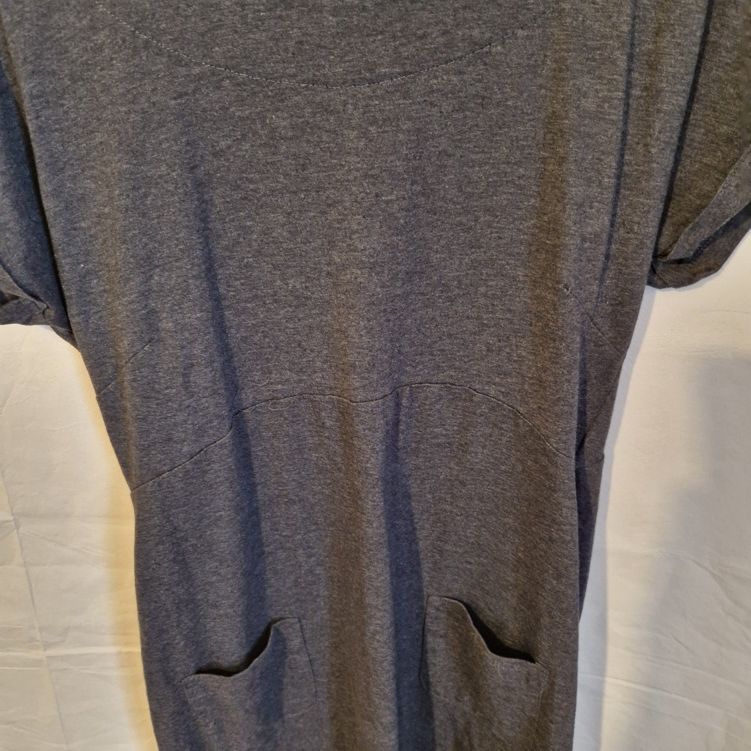 A grey Weird Fish midi shift dress in a cotton blend jersey with a round neck and front pockets.