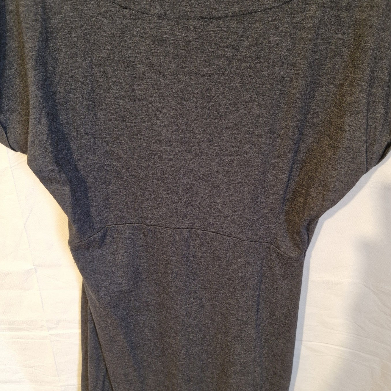 A grey cotton blend midi shift dress with a round neckline and short sleeves.